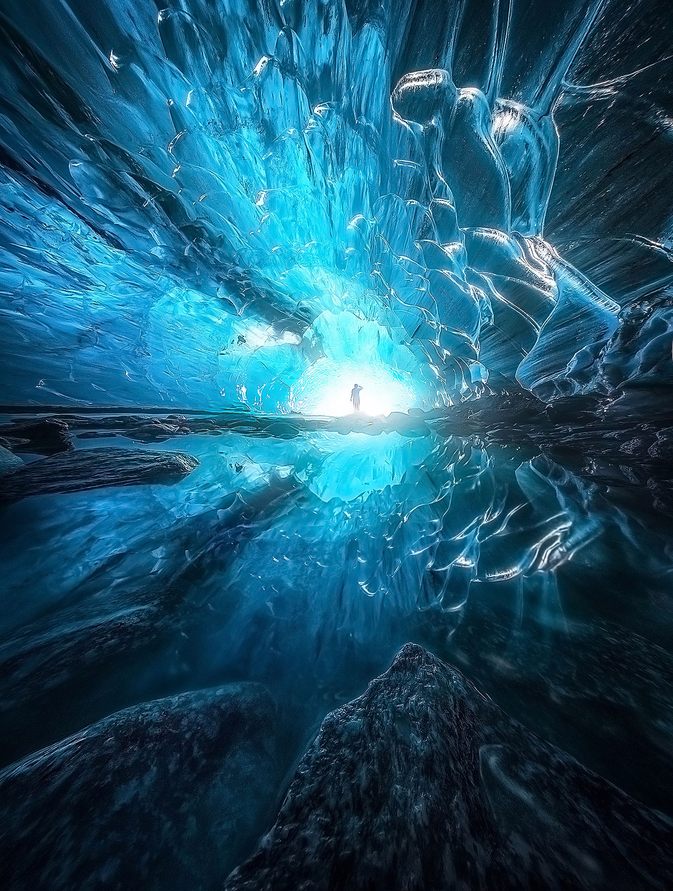 An icy reflection and self portrait from inside the depths of a glacier..