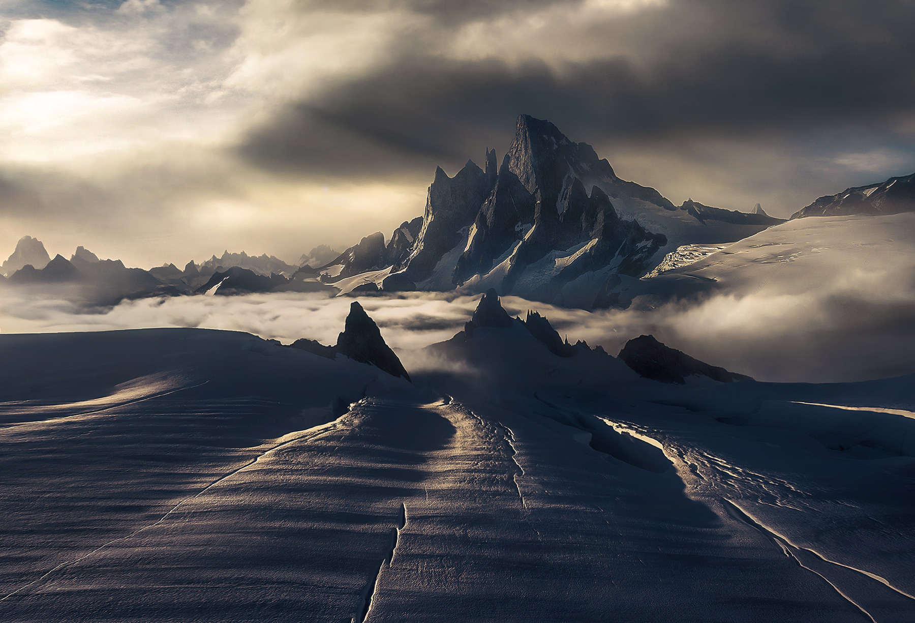 Devil's Thumb, one of Earth's great peaks, breaks through into the sky.