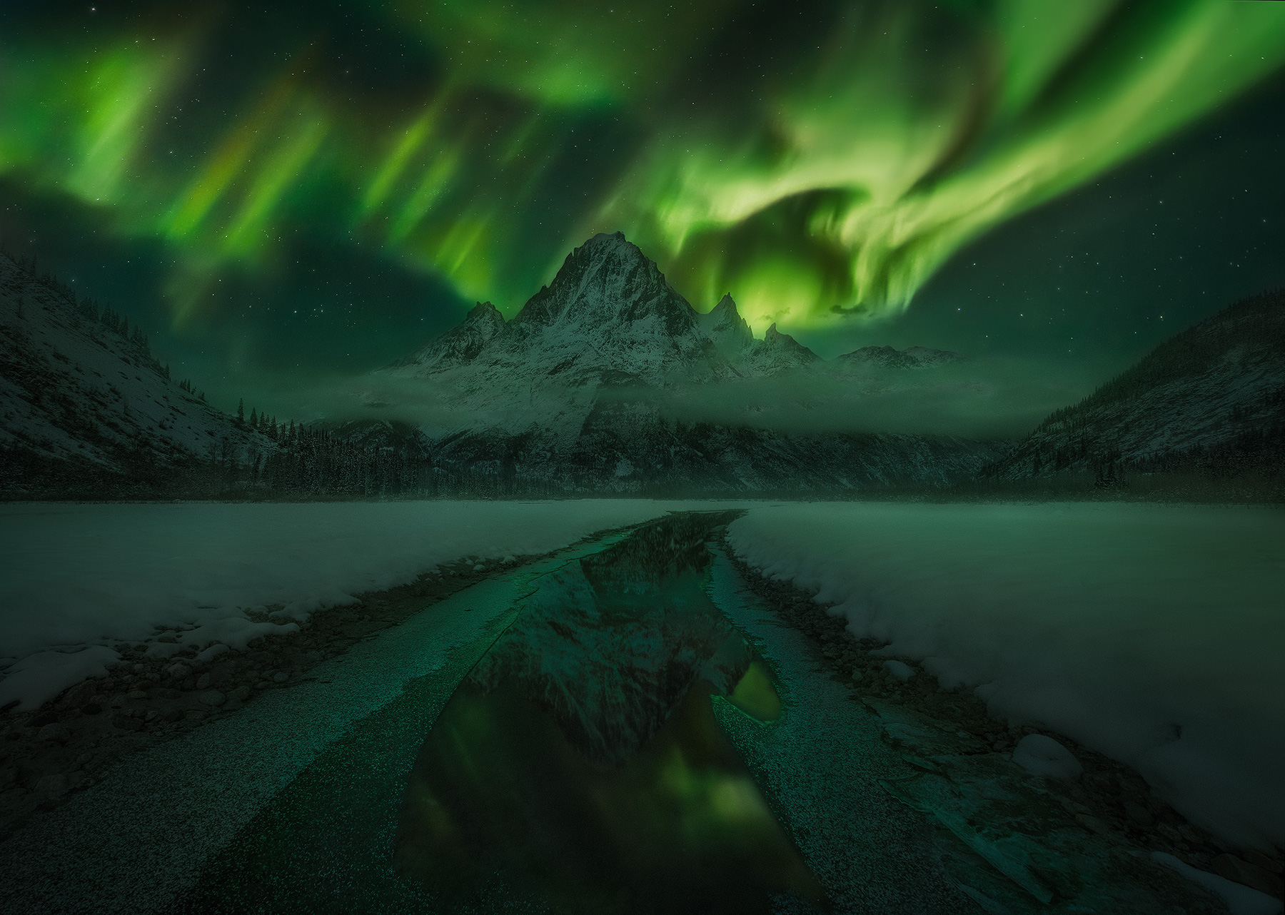 Dance of the Night (2014) One of the biggest peaks on the North American continent is also the least photographed. This is Mount Chutine, 9000 feet...