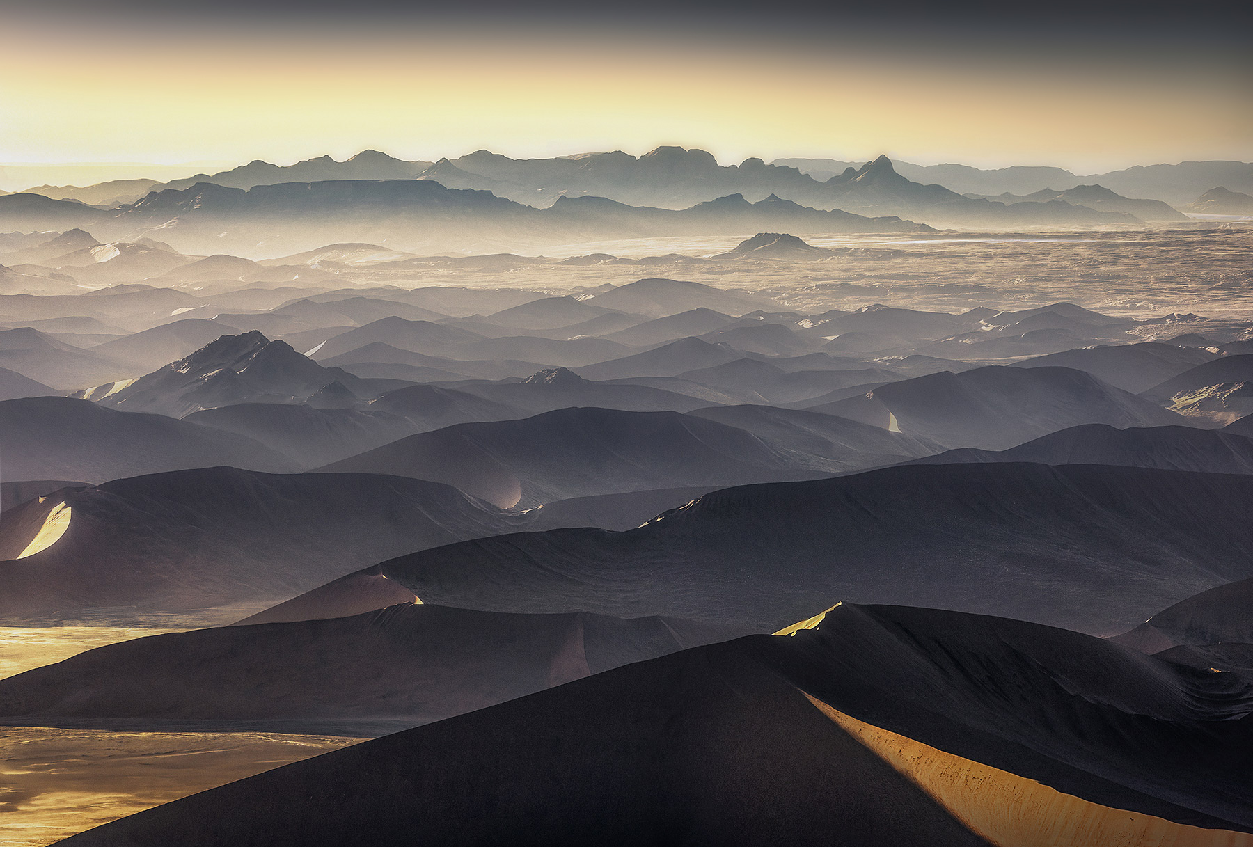 Endless layers of dunes above Namibian desert