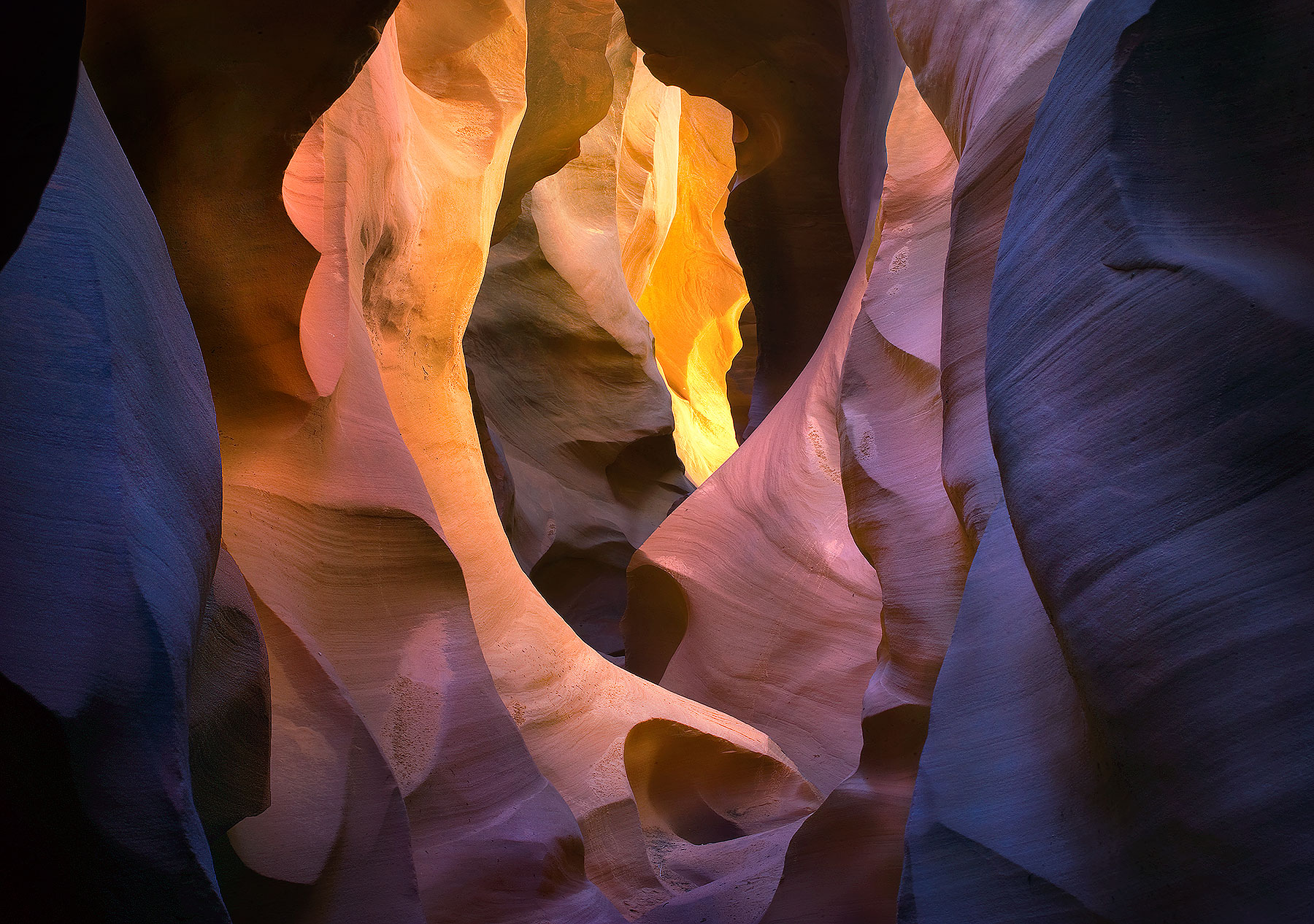 An incredible display of light, color and textures found in this remote sandstone slot canyon. The various rich colors and hues...