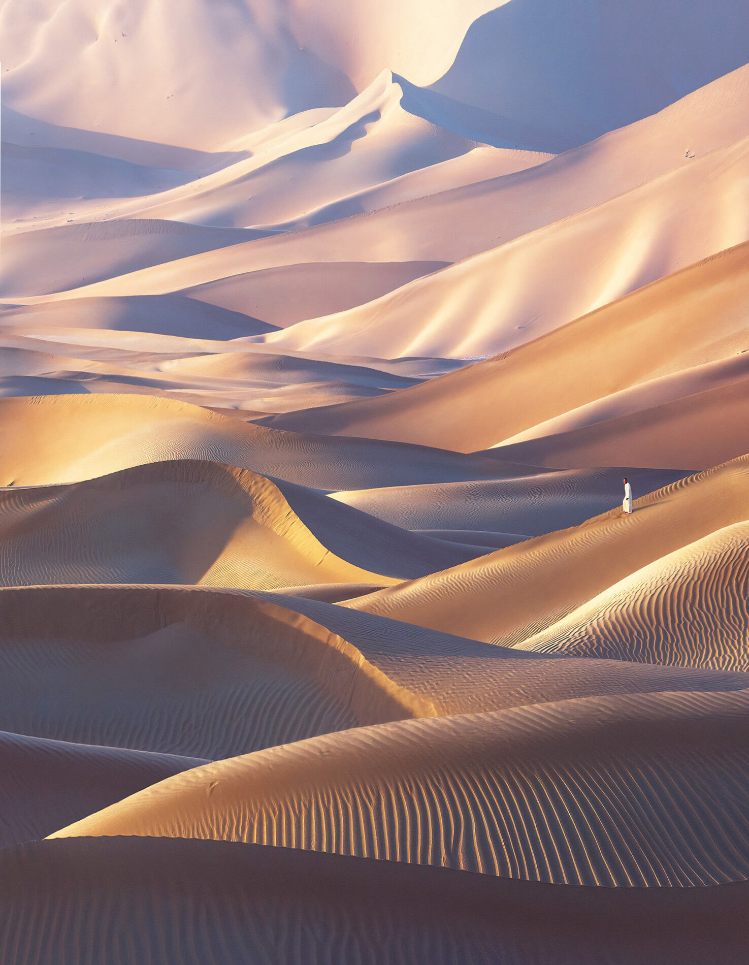 Friend Hamed Musharbak stands amidst endless layers of dunes in the remote empty quarter region of the UAE