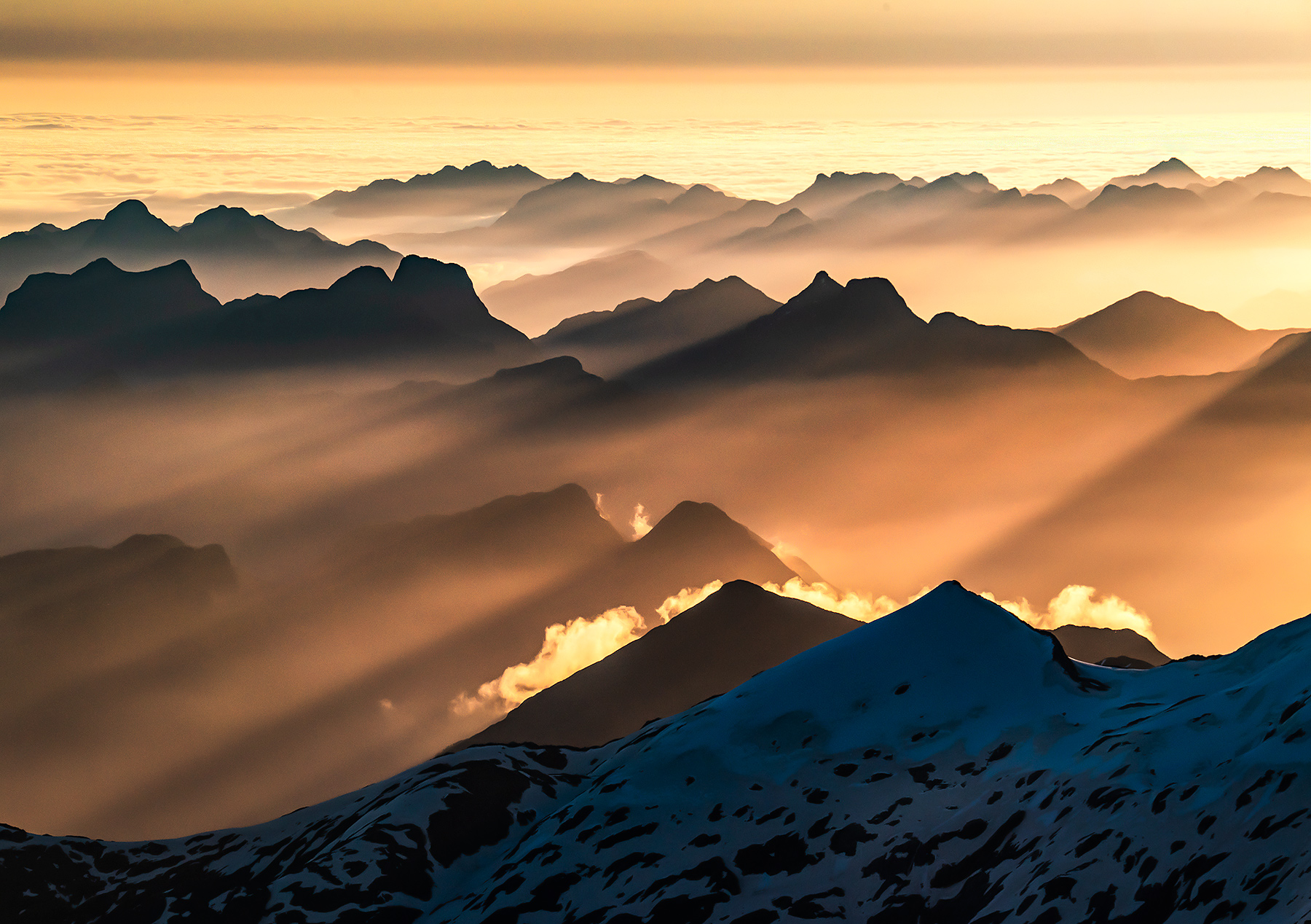 Fiordland from the air is always a special thing. &nbsp;Here some of that hazy marine air catches the sunset light over the southern...