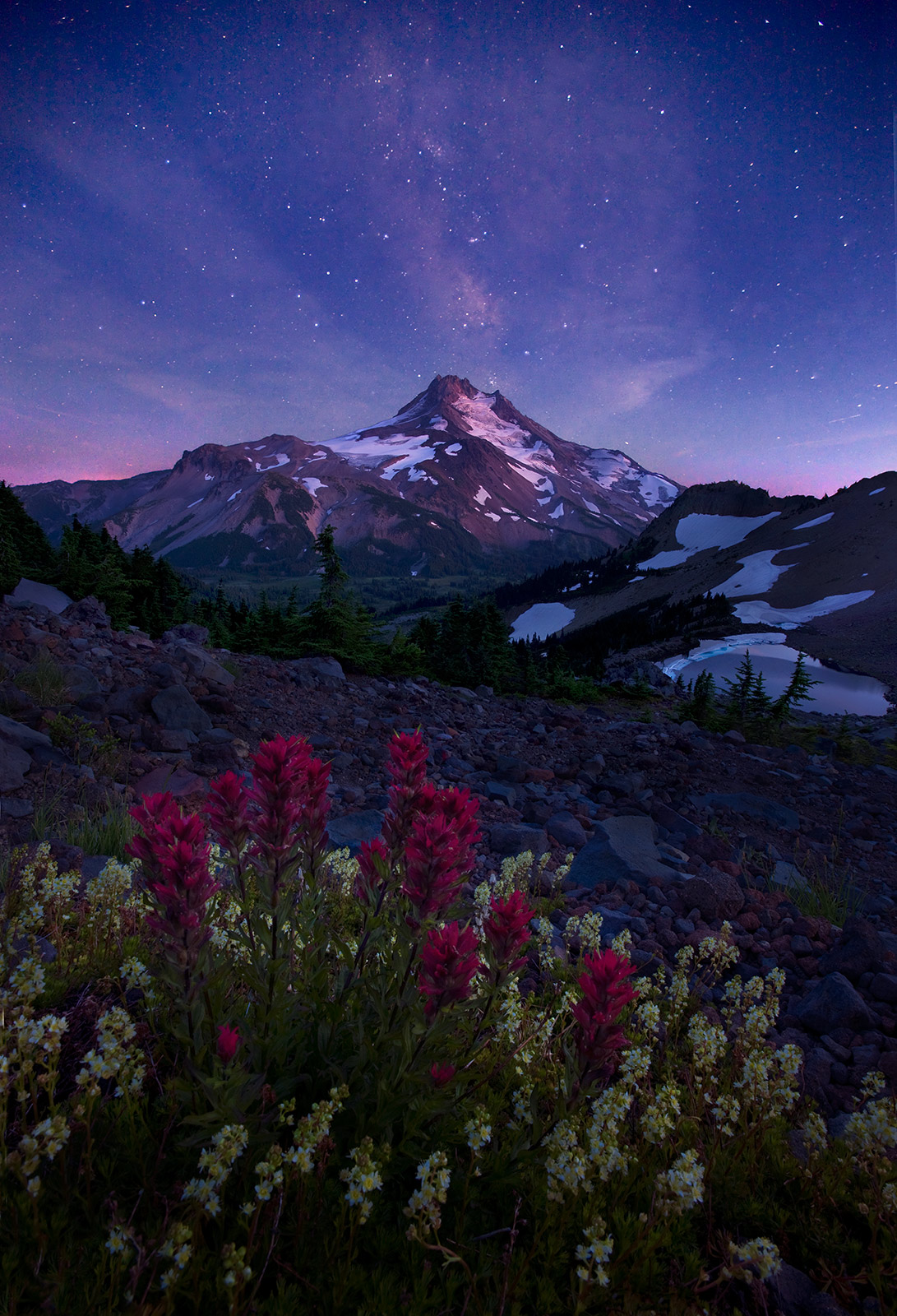 Composite image featuring twilight skies, wildflowers and Oregon's Mount Jefferson. The image was created from three exposures...
