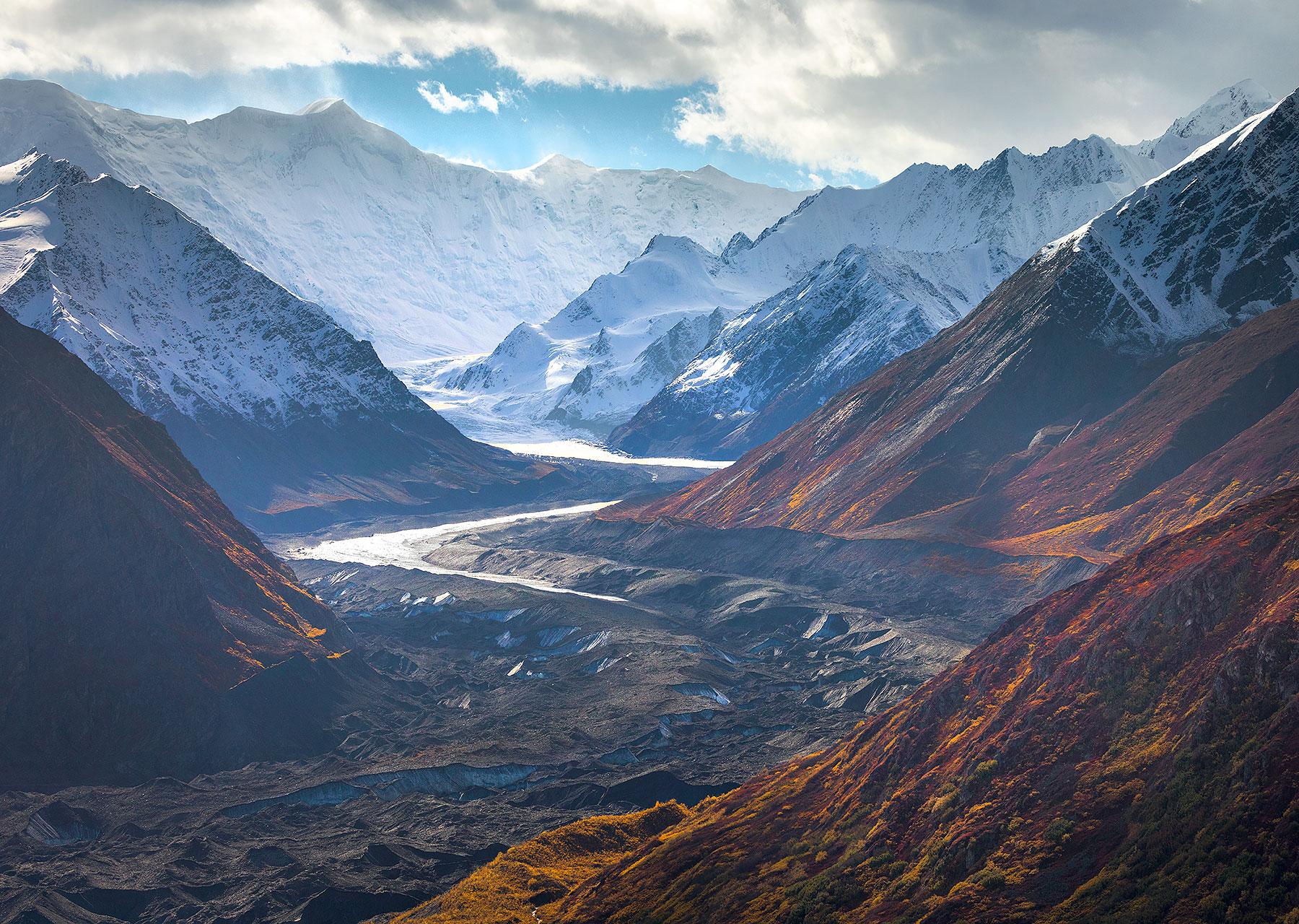I love the illustration here of the transition from Fall to Winter in the mountains of the Chugach Range.