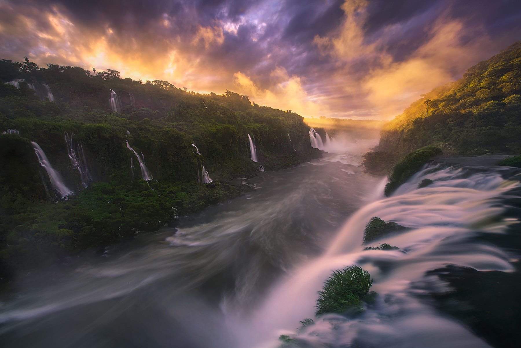 The amazing layers of waterfalls at Iguazu and some fiery sunset light!
