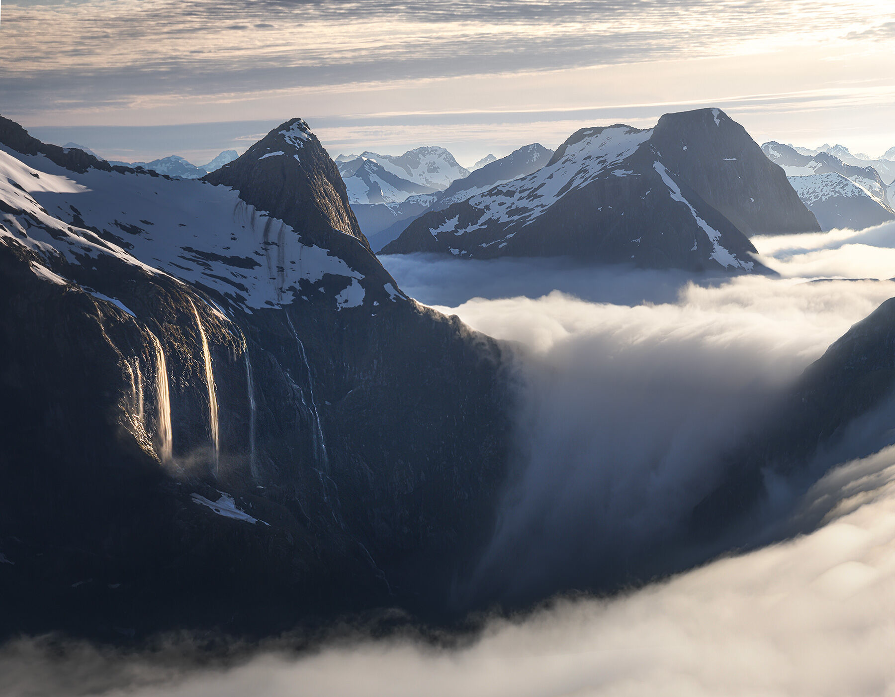 An unusual combination of cloud falls and water falls, in Fiordlands!