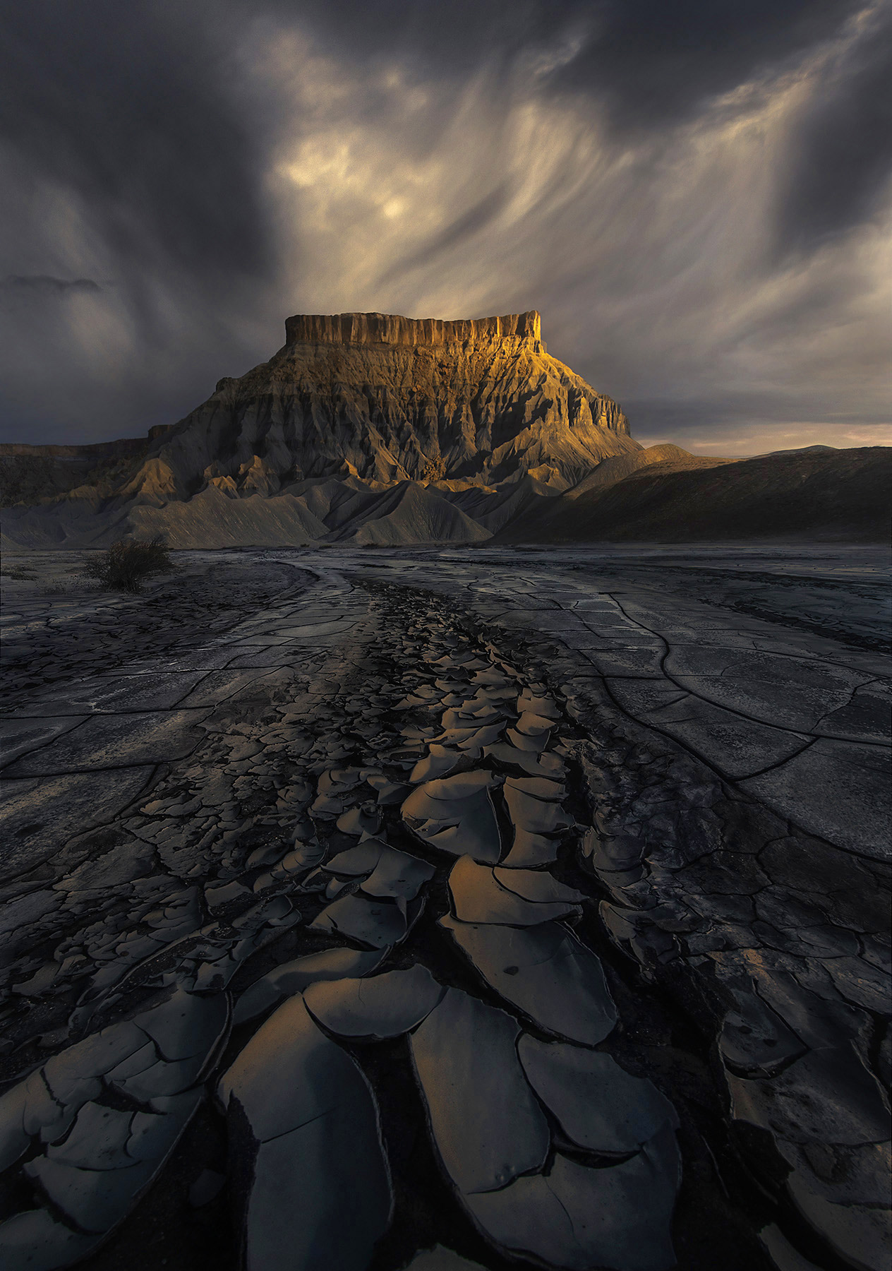 Alkiline badlands in Utah under stormy skies