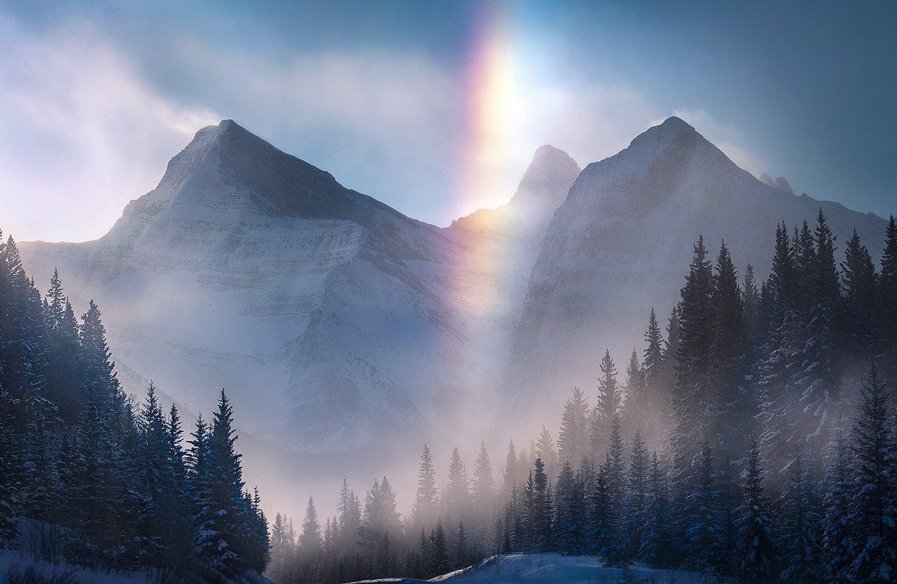 Extreme temperatures, -40 degrees at the time of this capture, produce amazing vertically oriented rainbows called Ice Bows...