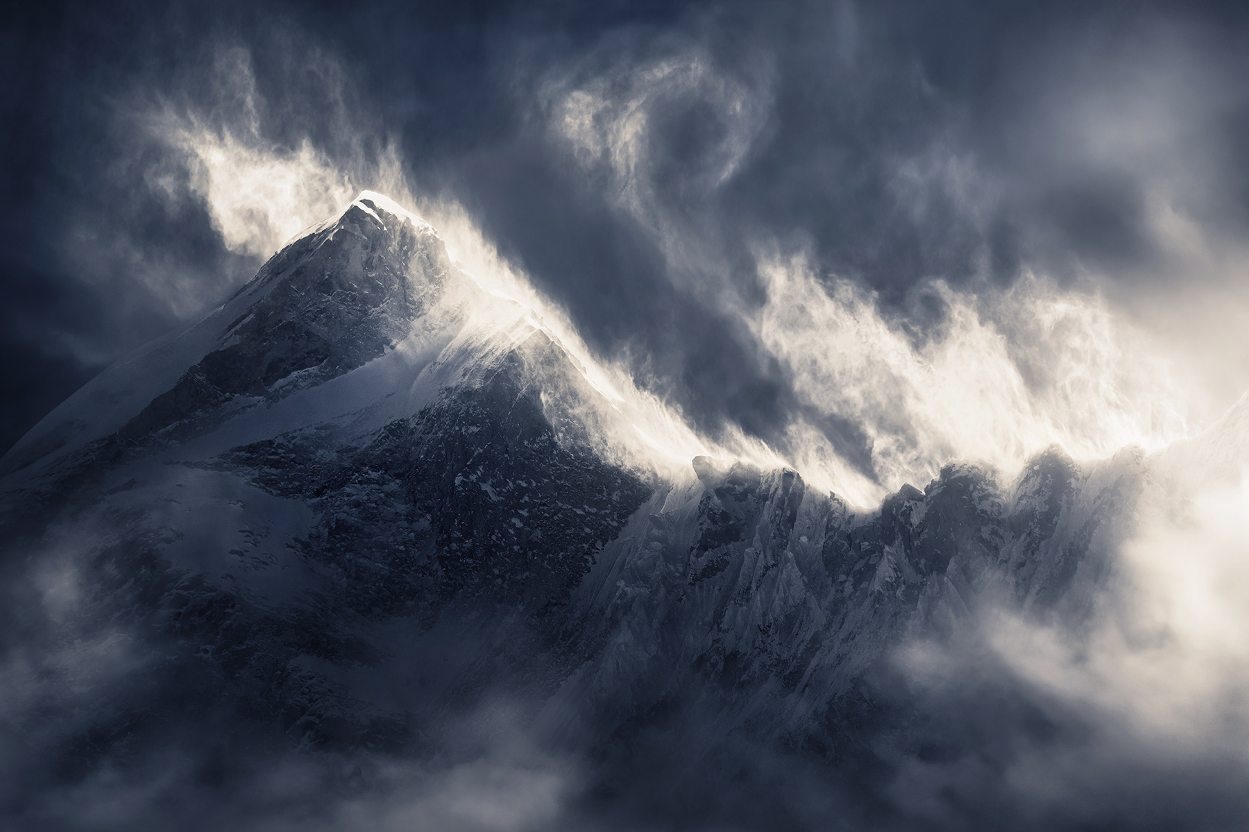 High peaks below the summit of Makalu captured during a fierce wind and blowing snow.  There is no image that captures these...