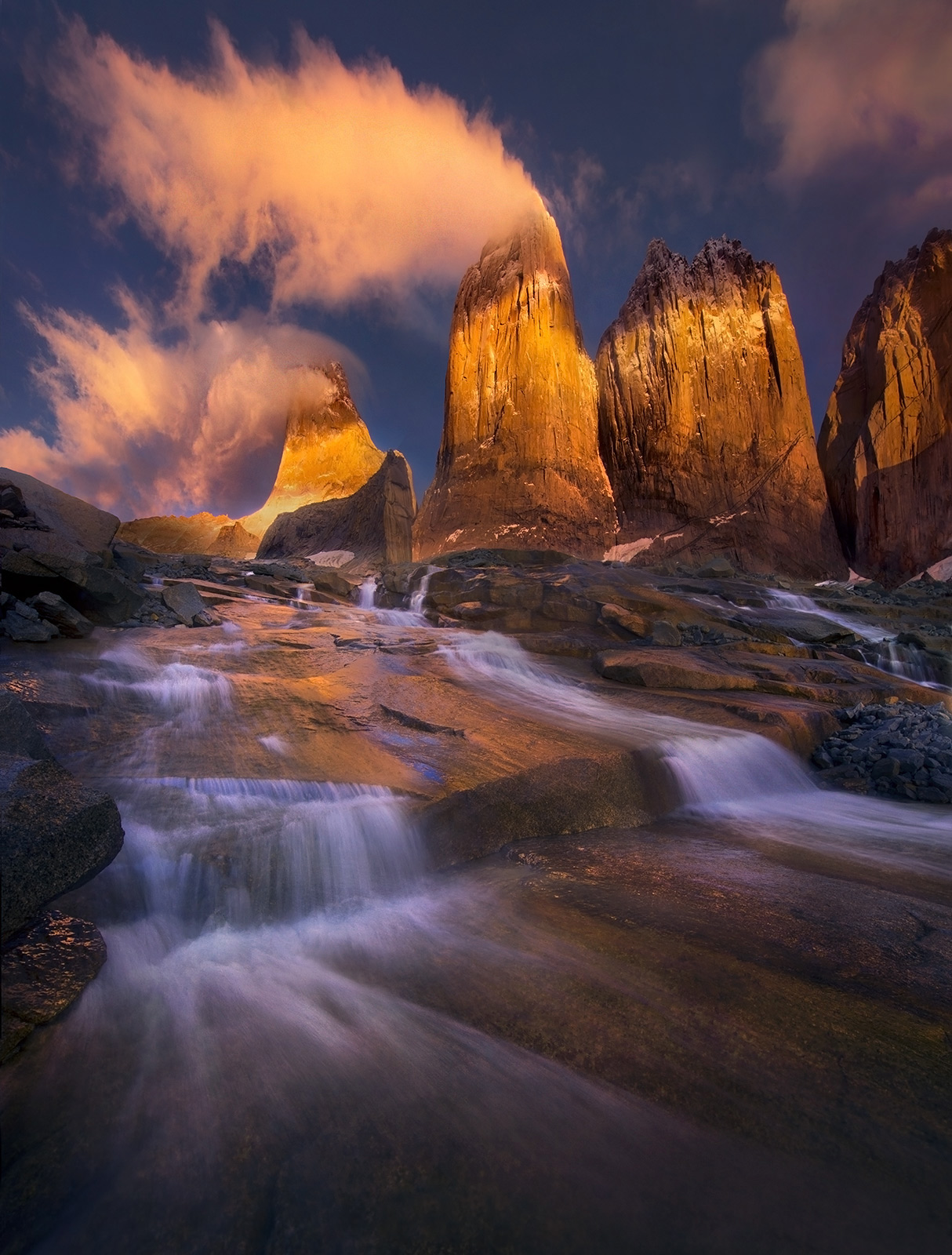 A unique view from the glacial streams above Chile's famous Three Towers captured at sunrise after a new snow.