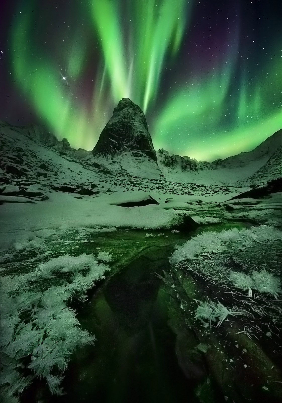 Here to Forever (2012) An amazing show of Aurora over peaks in the Yukon's Ogilvie Range. An extreme-high ISO was used combined with depth of field...