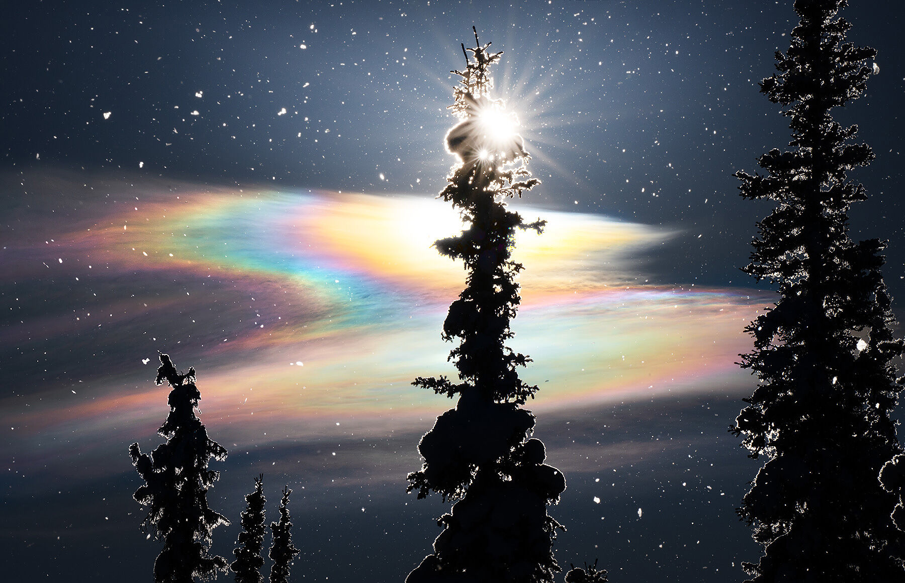 Nacreous Sparkle Rare polar statospheric formations called nacreous clouds emit rainbow colors in Alaska. Here I was able to capture also the...