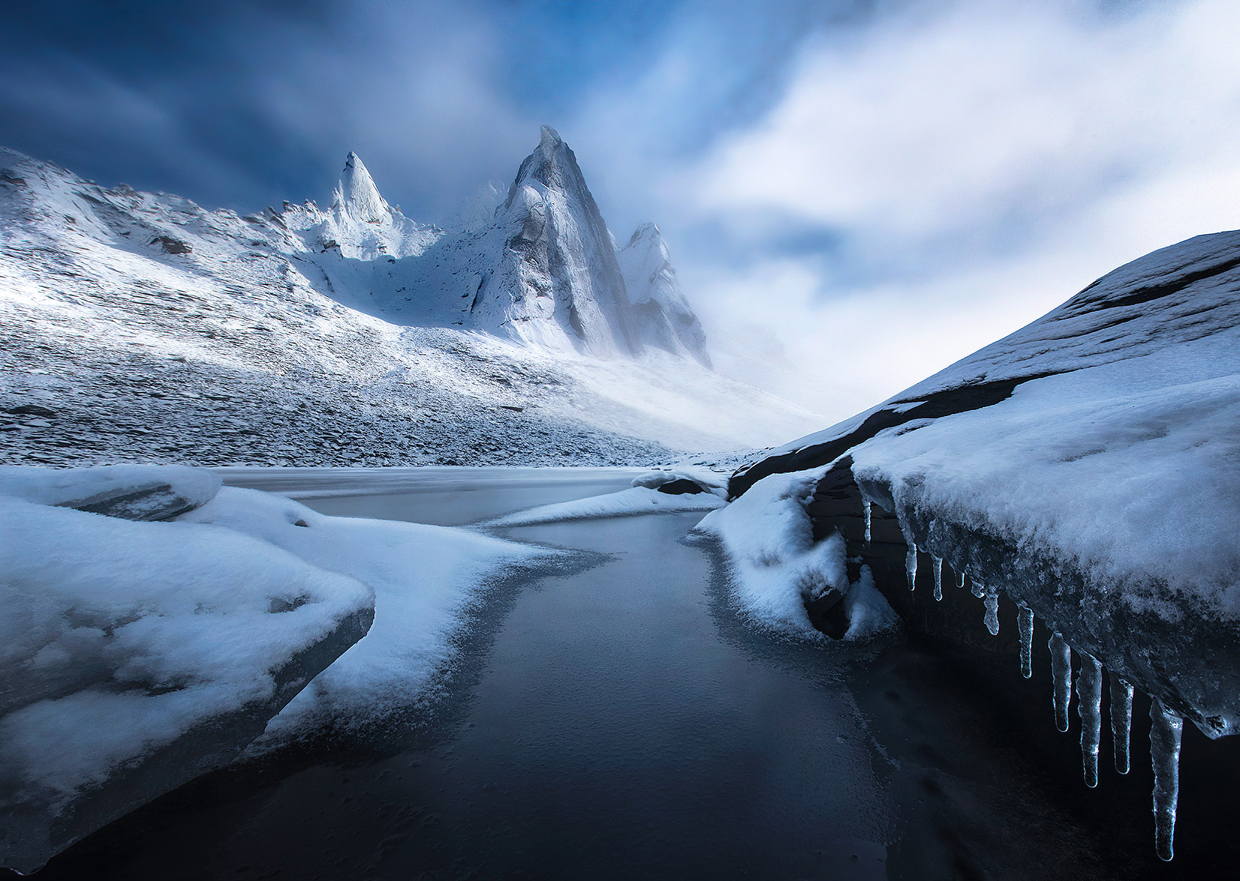 Peaks of Ice Peaks you have never seen photographed before from the most remote reaches of Tombstone Park, in the Yukon of Canada. The...