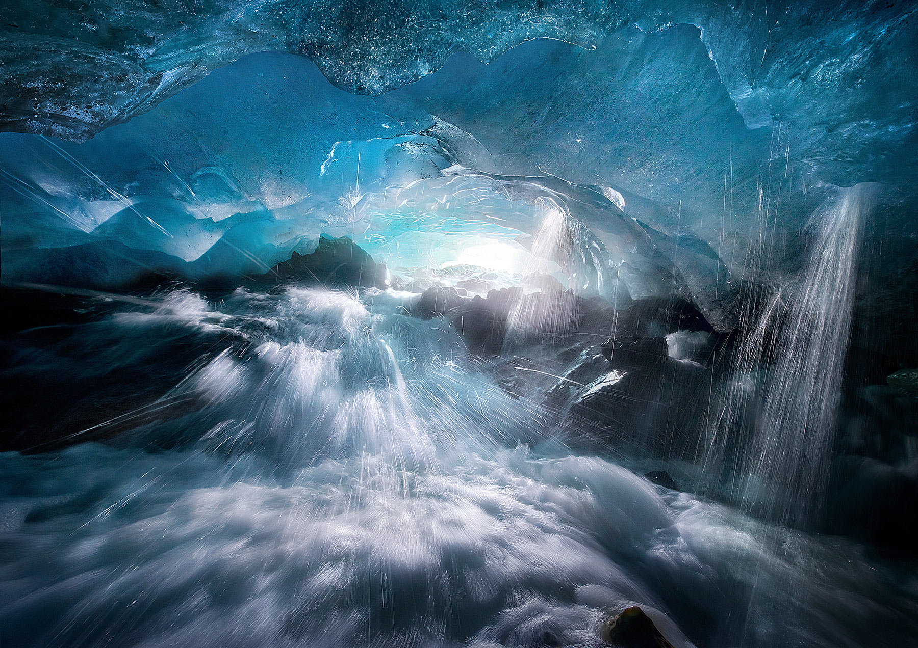 Rage against the Frozen (2012) Getting soaking wet inside a glacier deep in the middle of a raging stream that's carving a channel out of the blue ice was a...