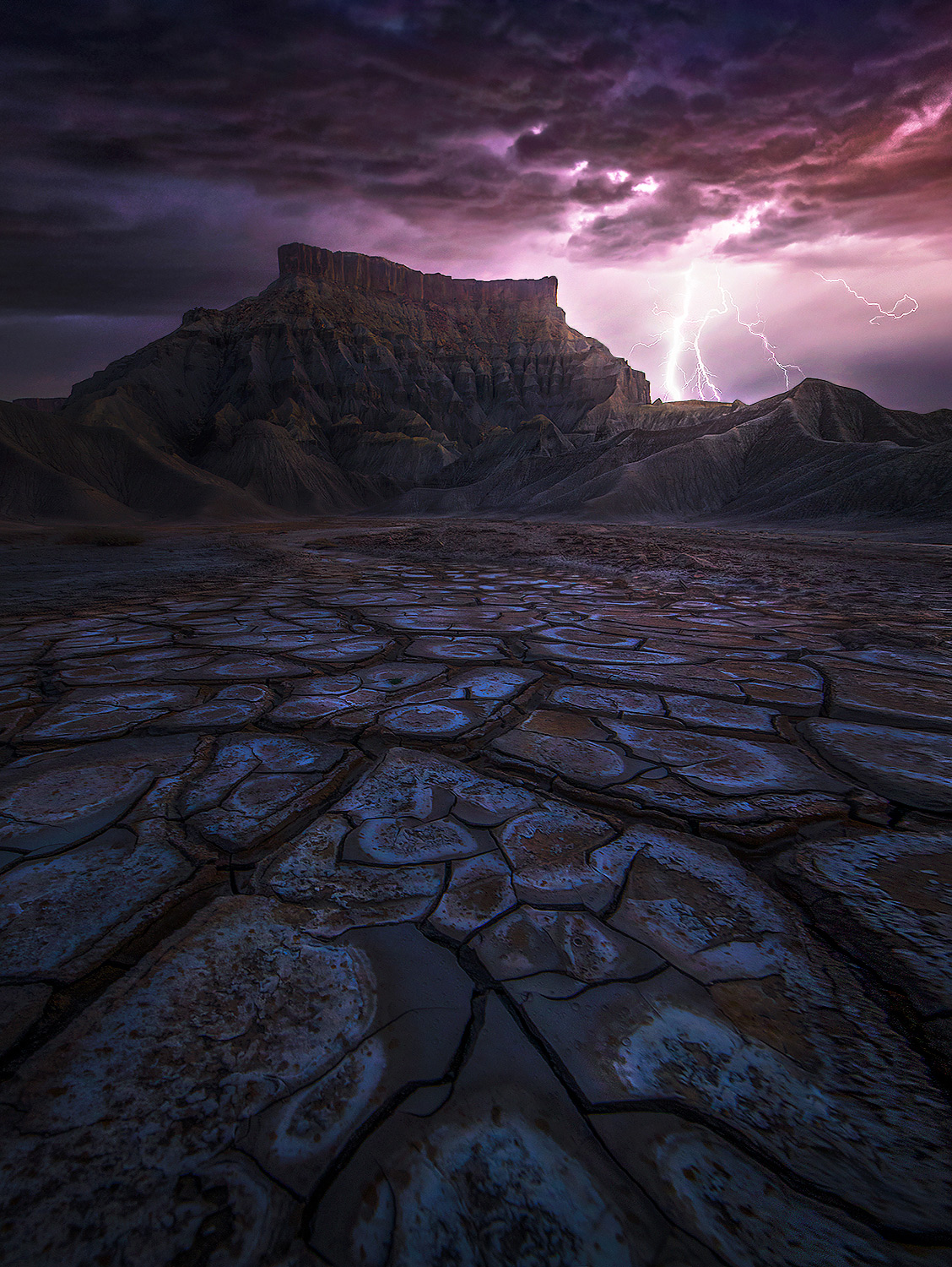 Alkaline mud cracks left behind by the rains await the return of the monsoon.