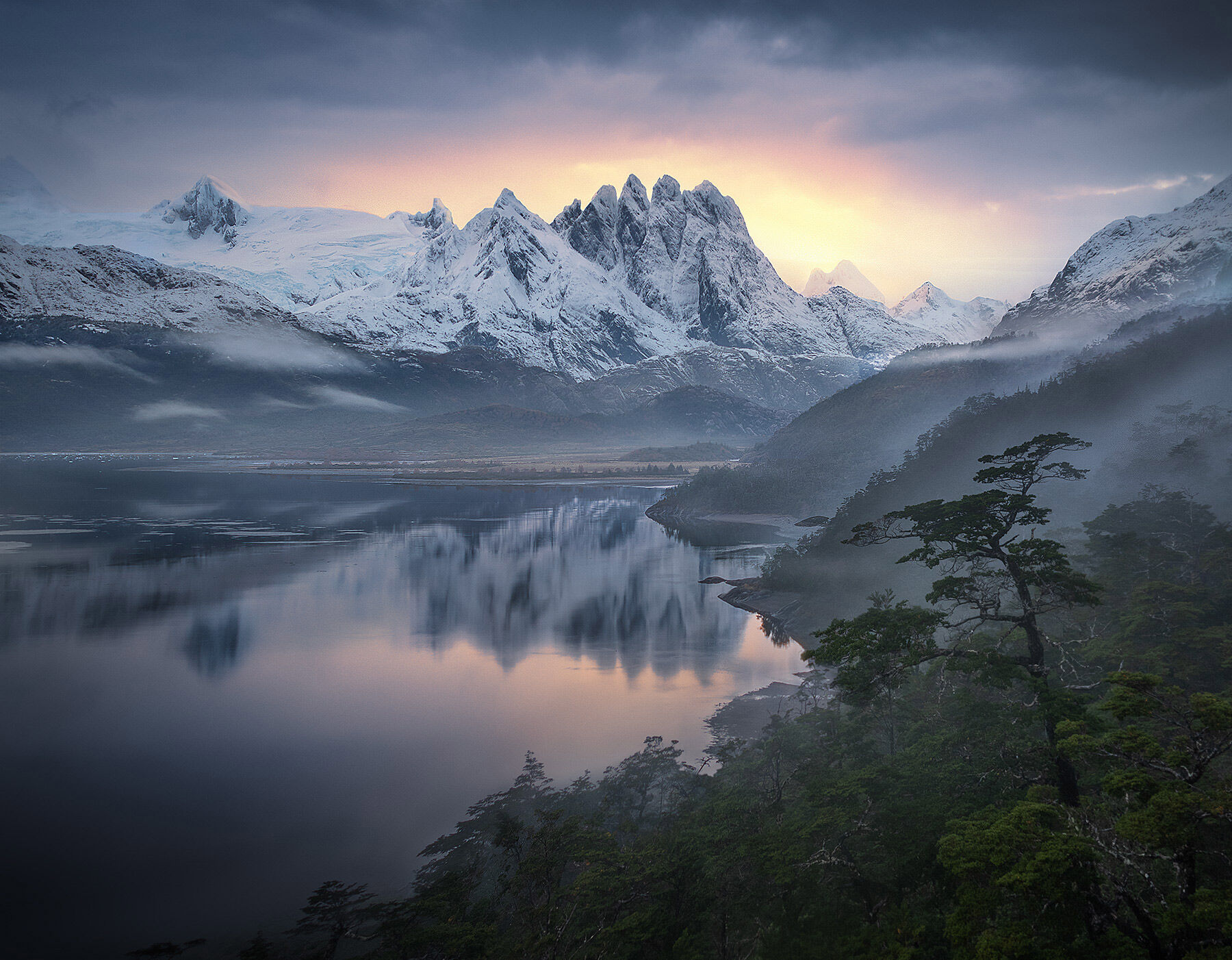 Rise from the Mists The Devil's Hand, a rarely seen peak deep in the Chilean Fjords appears from the mist which was a prominent part of our the trip...