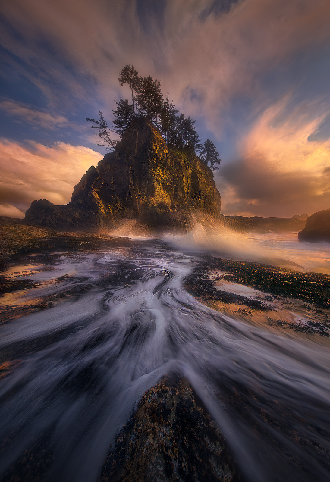 A unique perspective on the towering sea islands of the Olympic Coast in Washington featuring tremendous combination of wave...