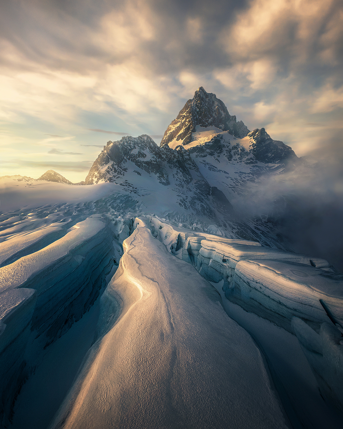 The great Mt. Tutuko rises from the mass of cracking glaciers surrounding. &nbsp;