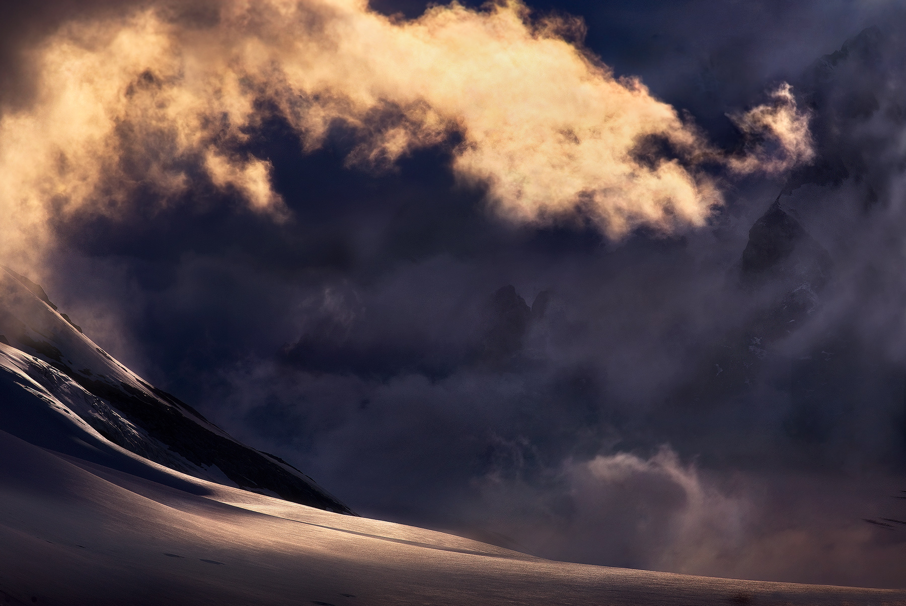 Light in the Pacific Range, British Columbia. &nbsp;Look closely at the releif of the background peaks through the clouds. &nbsp...