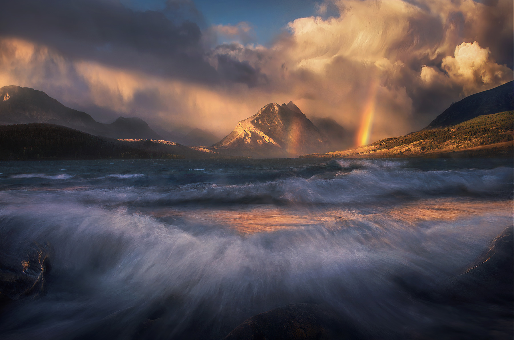 Roaring waves as the storm closes on St. Mary Lake in Glacier National Park creating some amazing light.
