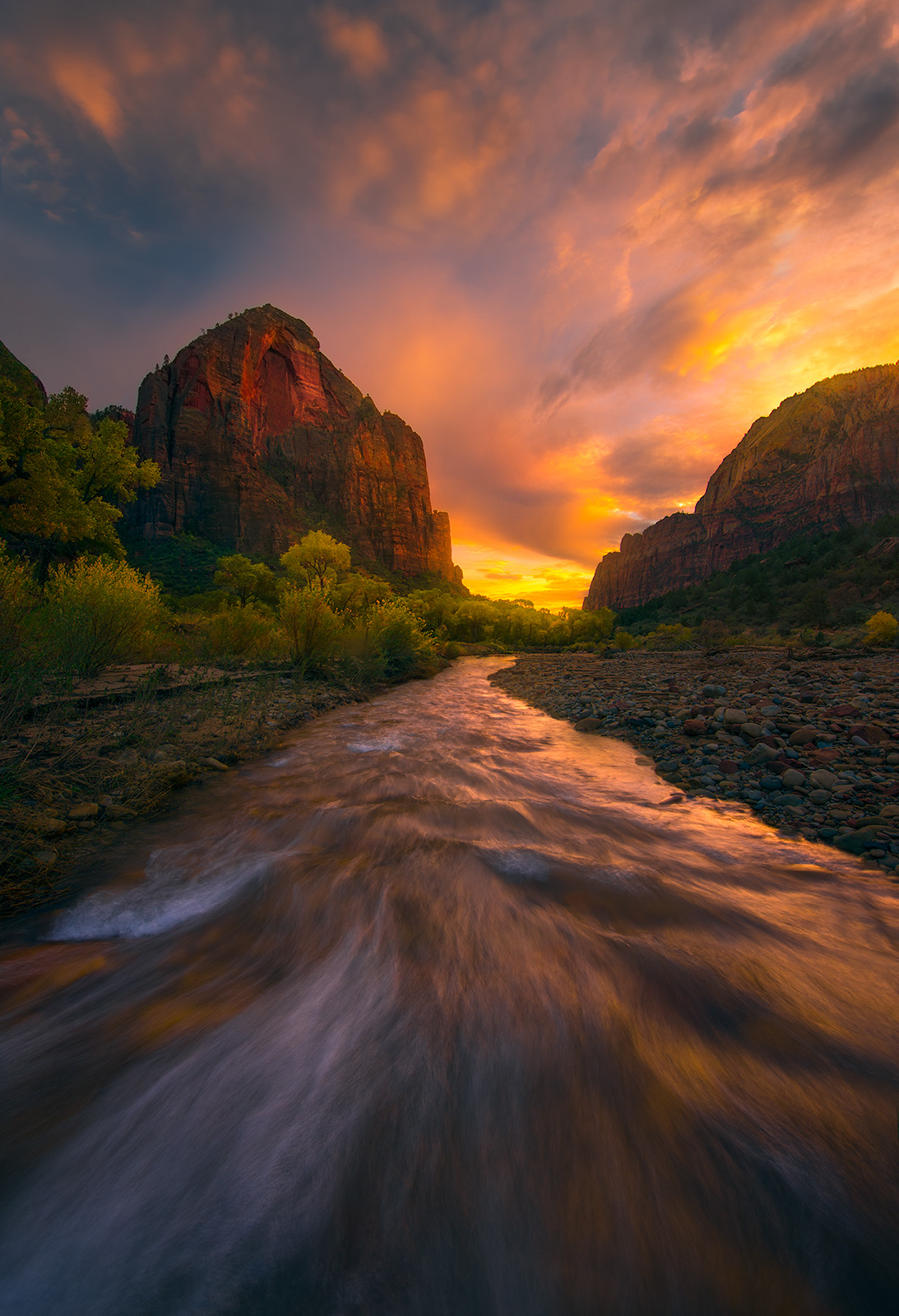 Rushing waters of Zion's Virgin river flowing through massive sandstone towers throughout.&nbsp;