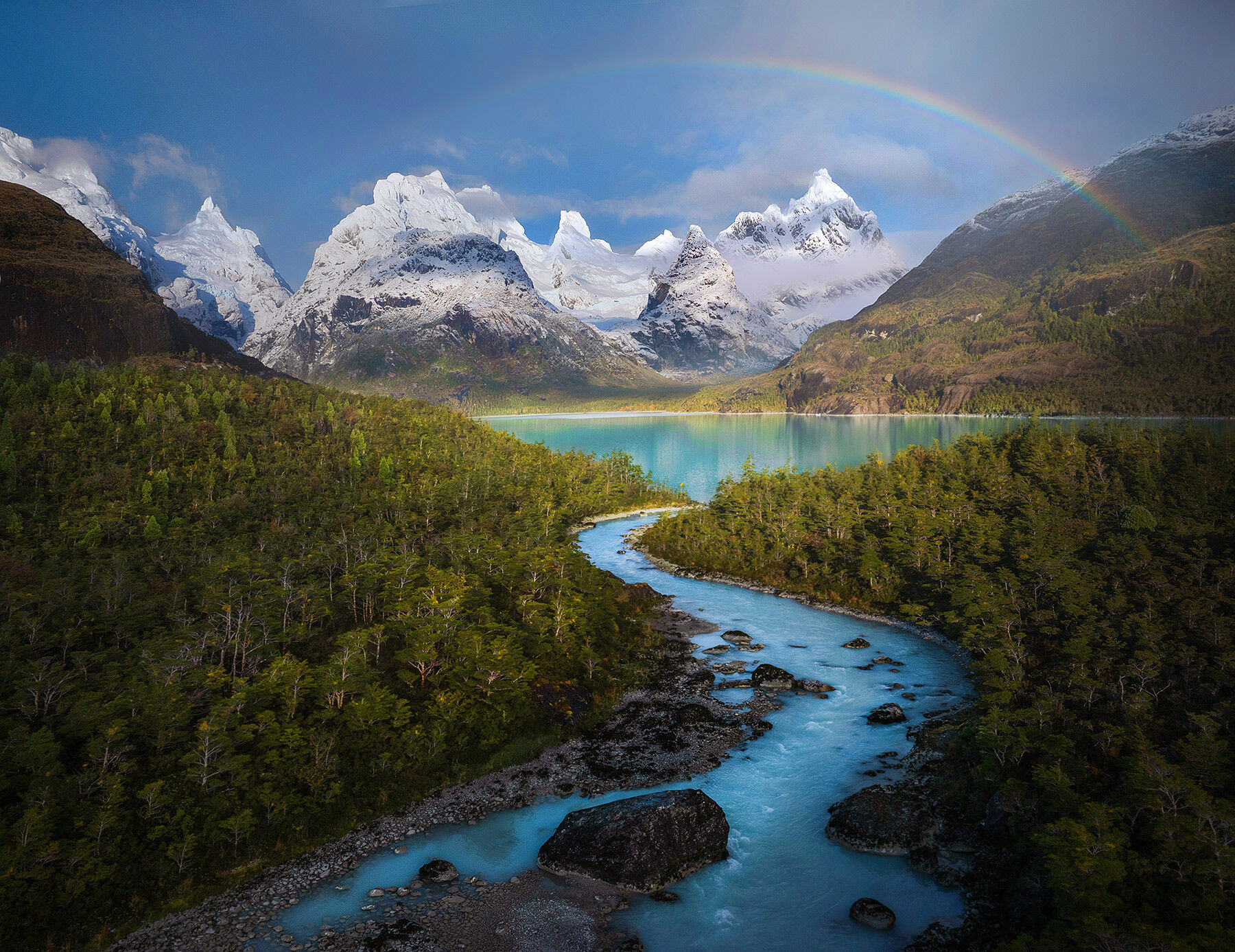 Turquoise Rainbow A memorable moment as the Sarmiento Range finally cleared revealing its amazing summits with glacial lakes, rivers and rainforest...