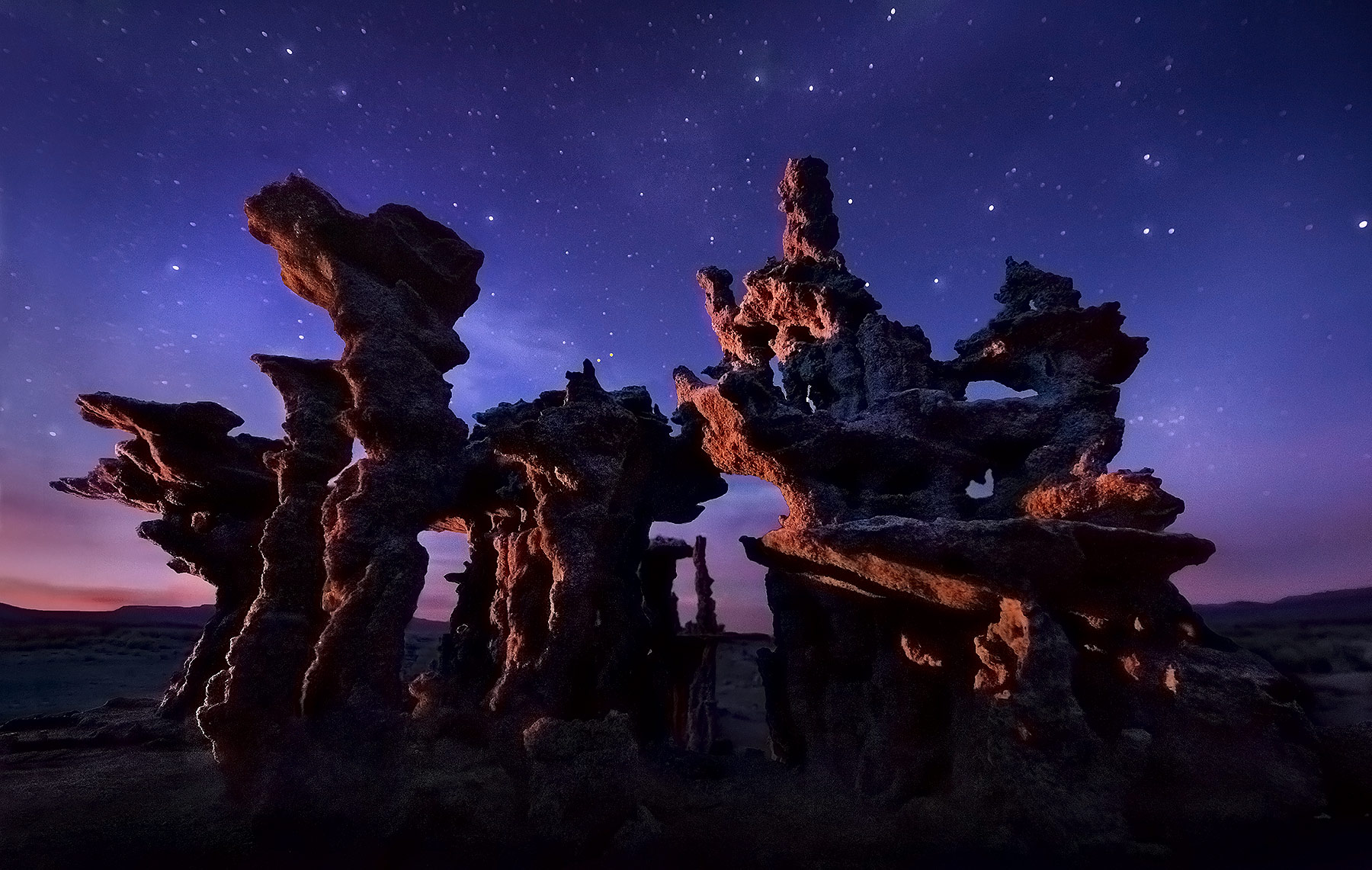 Twilight Kingdom (2011) Sand Tufa's at California's Mono Lake reminded me of castles, so I light-painted and depth-of-field-blended to get this unique...