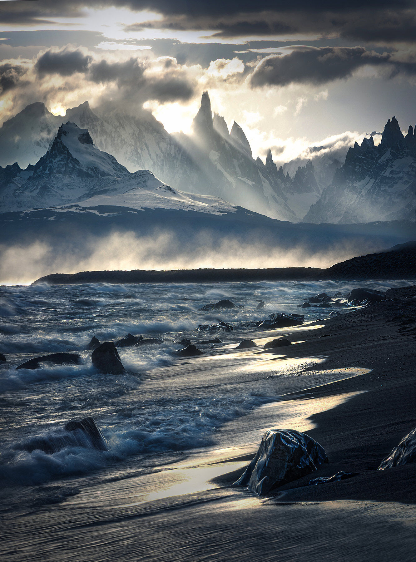 Wind whipping up waves and water on Lago Veidma, Argentina