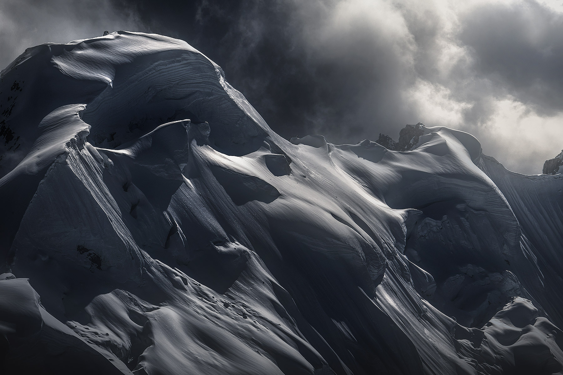 White Monsters Snow cornices on the shoulders of King Peak, below mount Logan, Yukon at about 13,000ft. An intimate play of light gave...