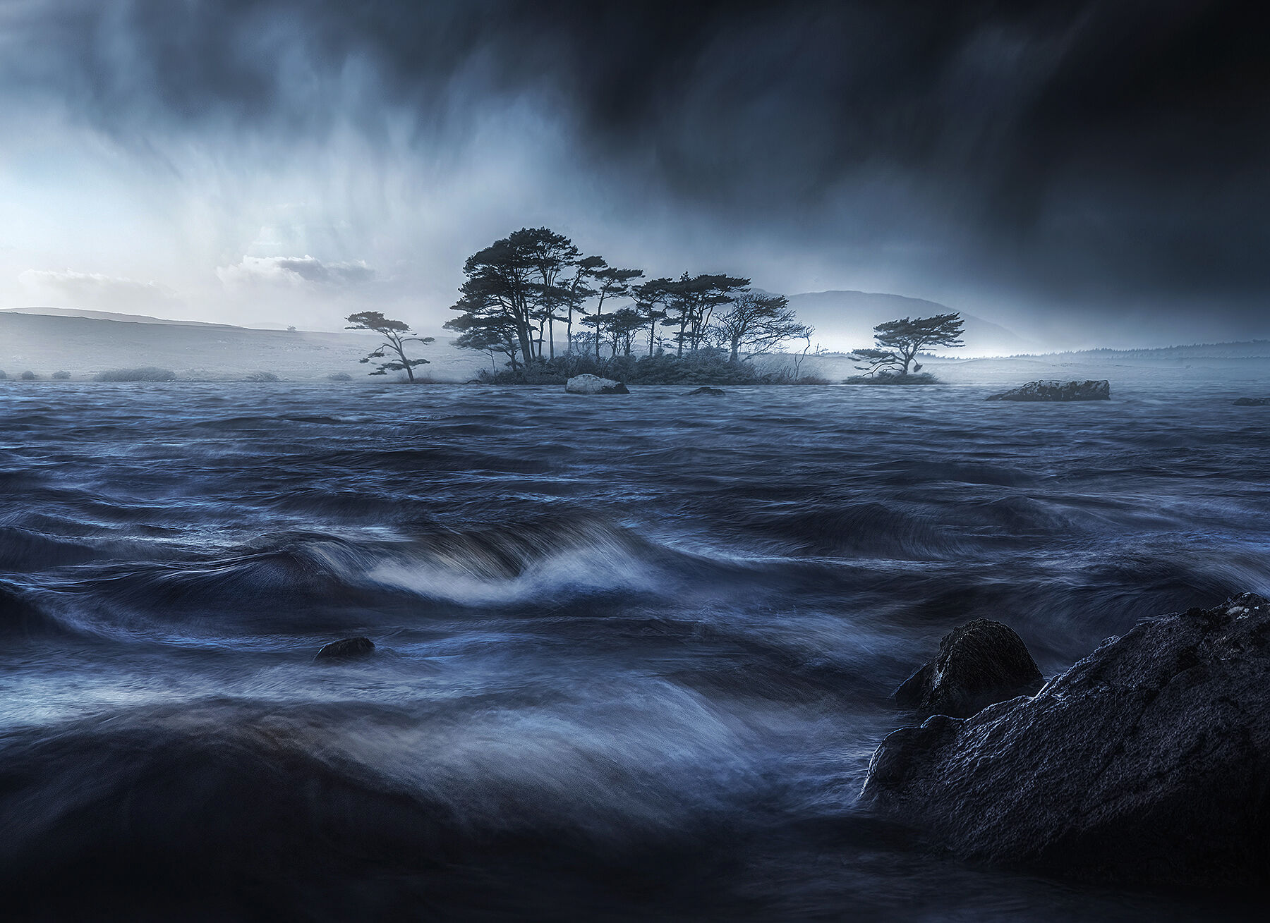 Stormy conditions and fierce winds rolling in off this lake near Connemara in Ireland