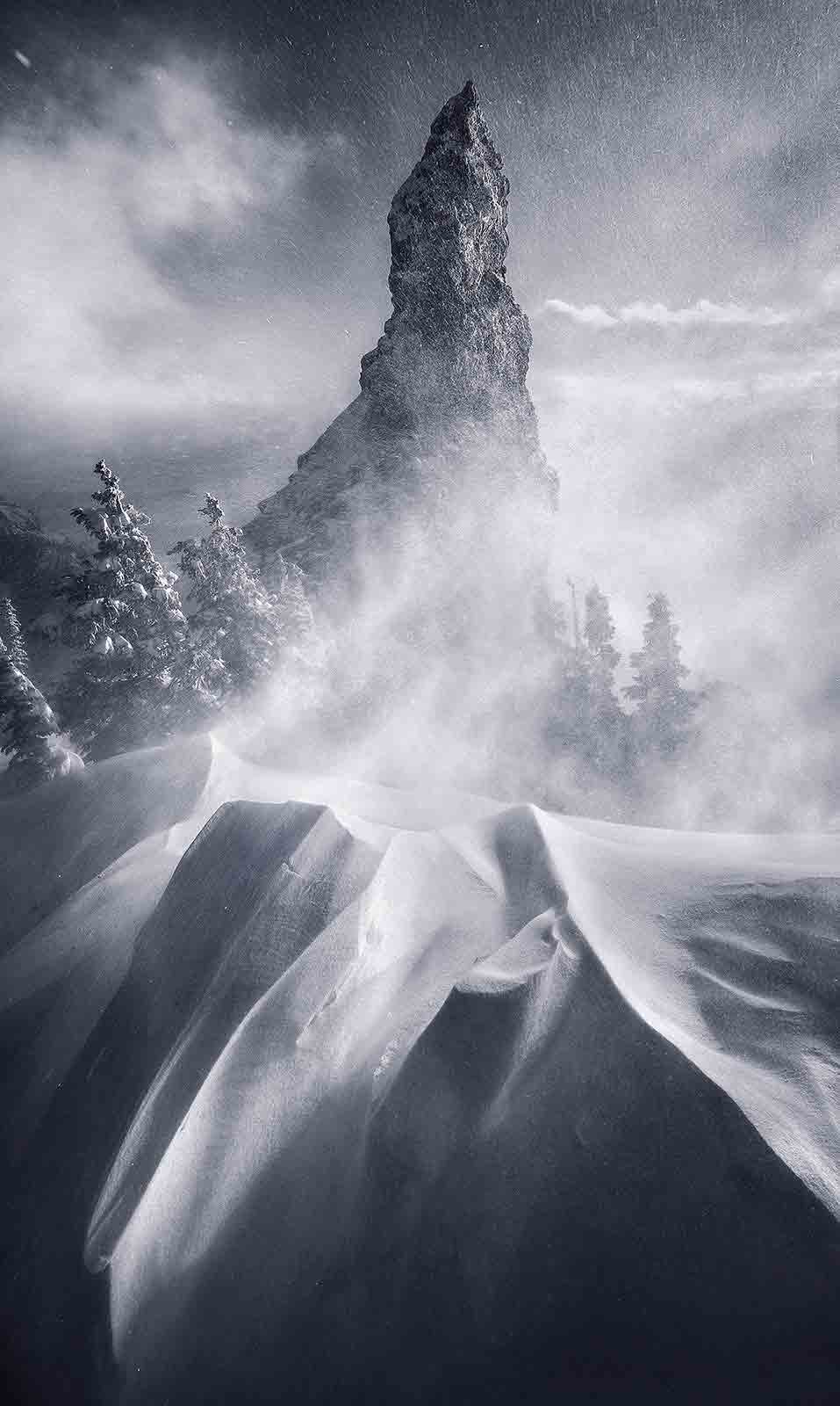 Blizzard conditions surrounding this giant rock spire high on Oregon's Iron Mountain in mid-Winter.